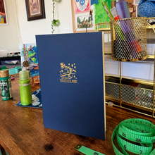 Load image into Gallery viewer, B and C-Grade LegendLark Logo Saddle Stitch Notebook